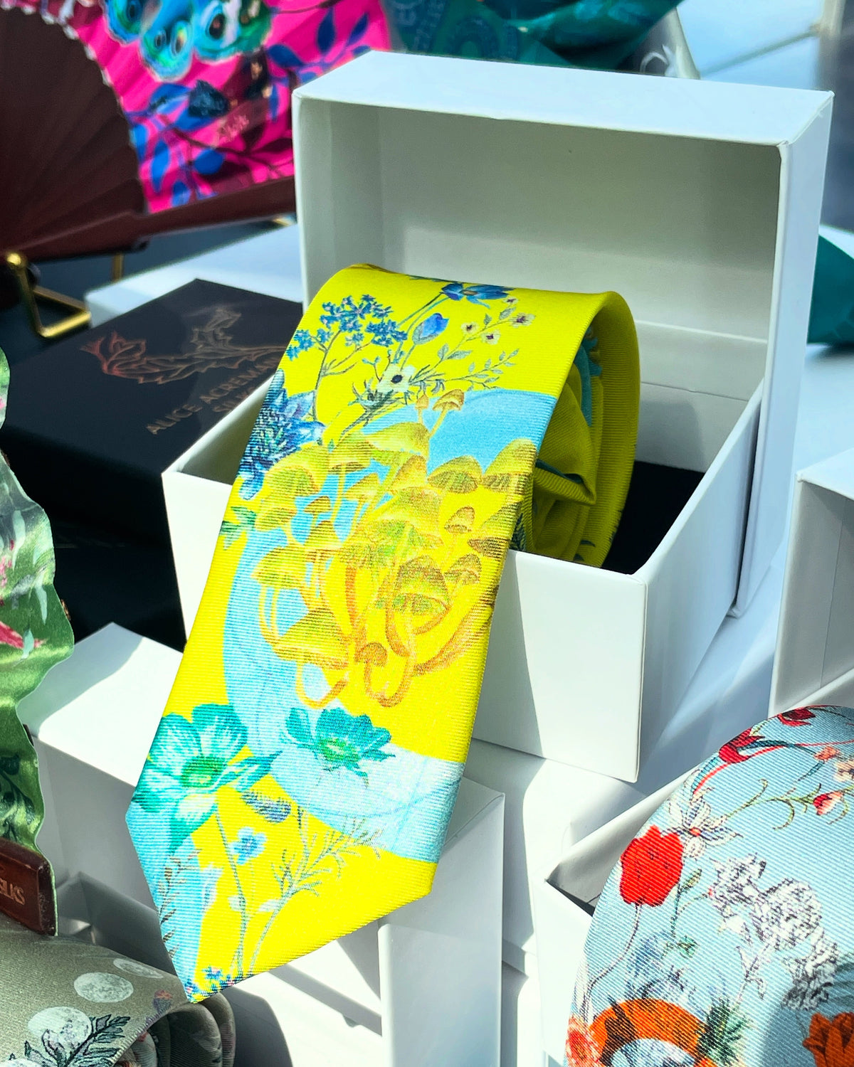 Vibrant yellow and pale blue ‘Luciferin’ floral silk tie – view 6