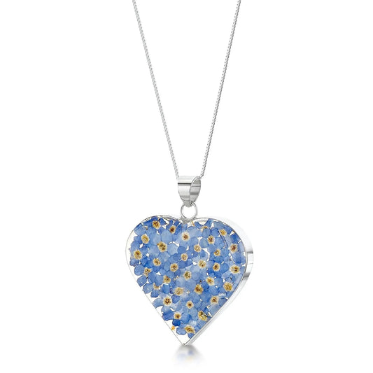 Forget-me-not heart necklace by  Shrieking Violet® Sterling silver heart filled with real forget-me-not flowers. Mothers day jewellery gift