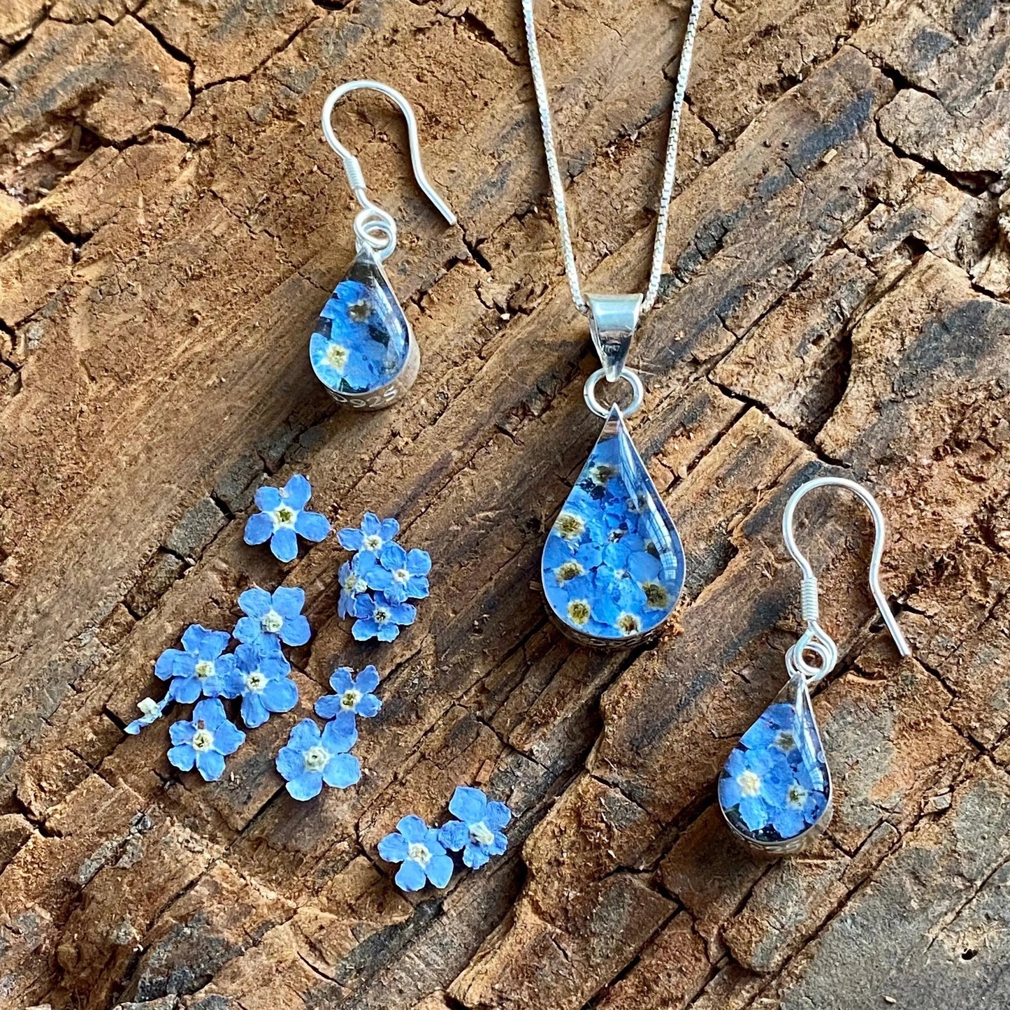 Forget-me-not necklace by Shrieking Violet® Sterling silver teardrop pendant with real forget-me-nots. Ideal for Mothers day or bridesmaid jewellery.